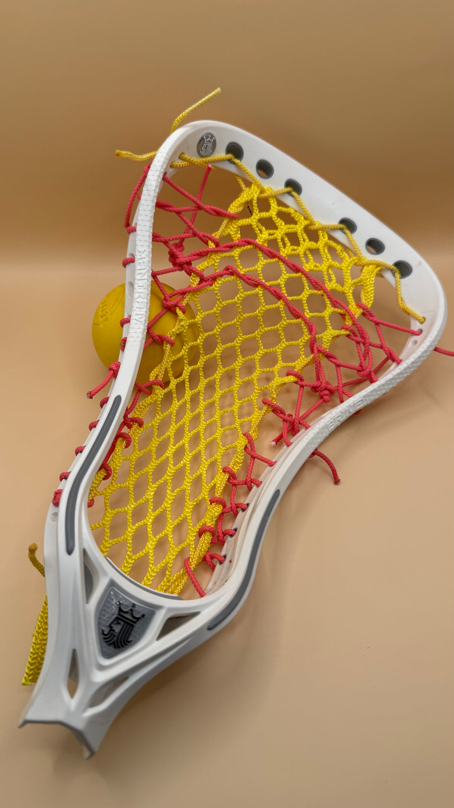 Brine Mantra IV girls lacrosse head, yellow mesh, pink strings