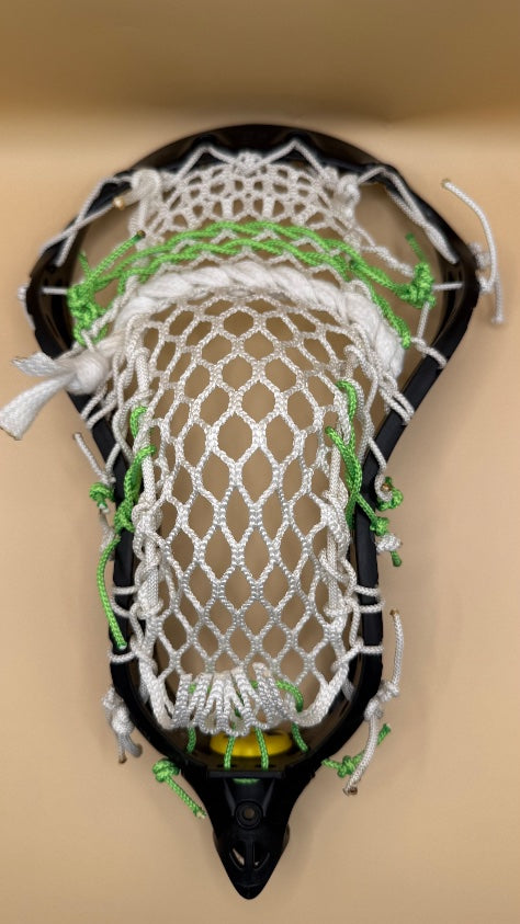 Under Armour Player boys lacrosse head, white mesh, green strings
